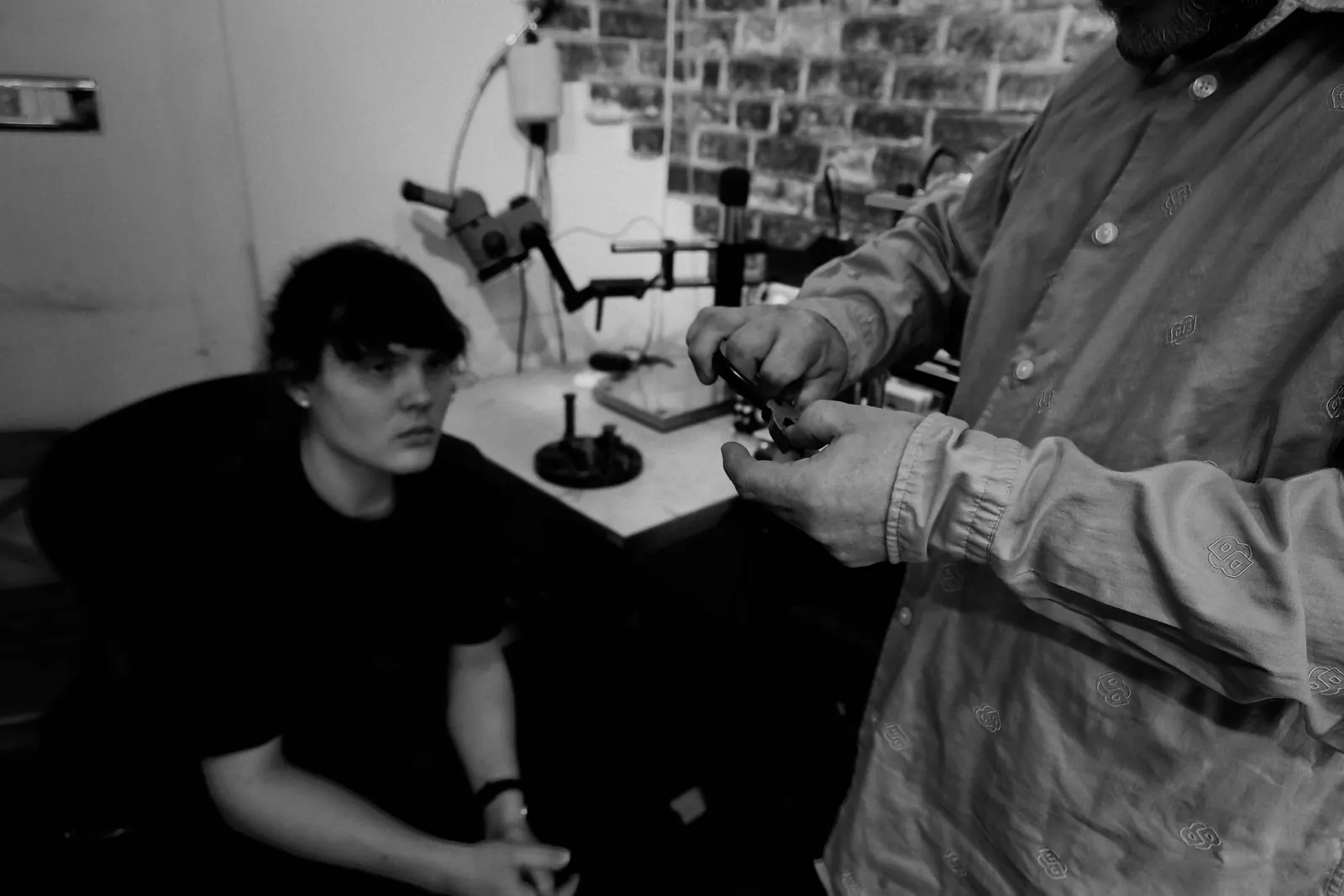 James and his father assessing jewellery in their Birmingham workshop